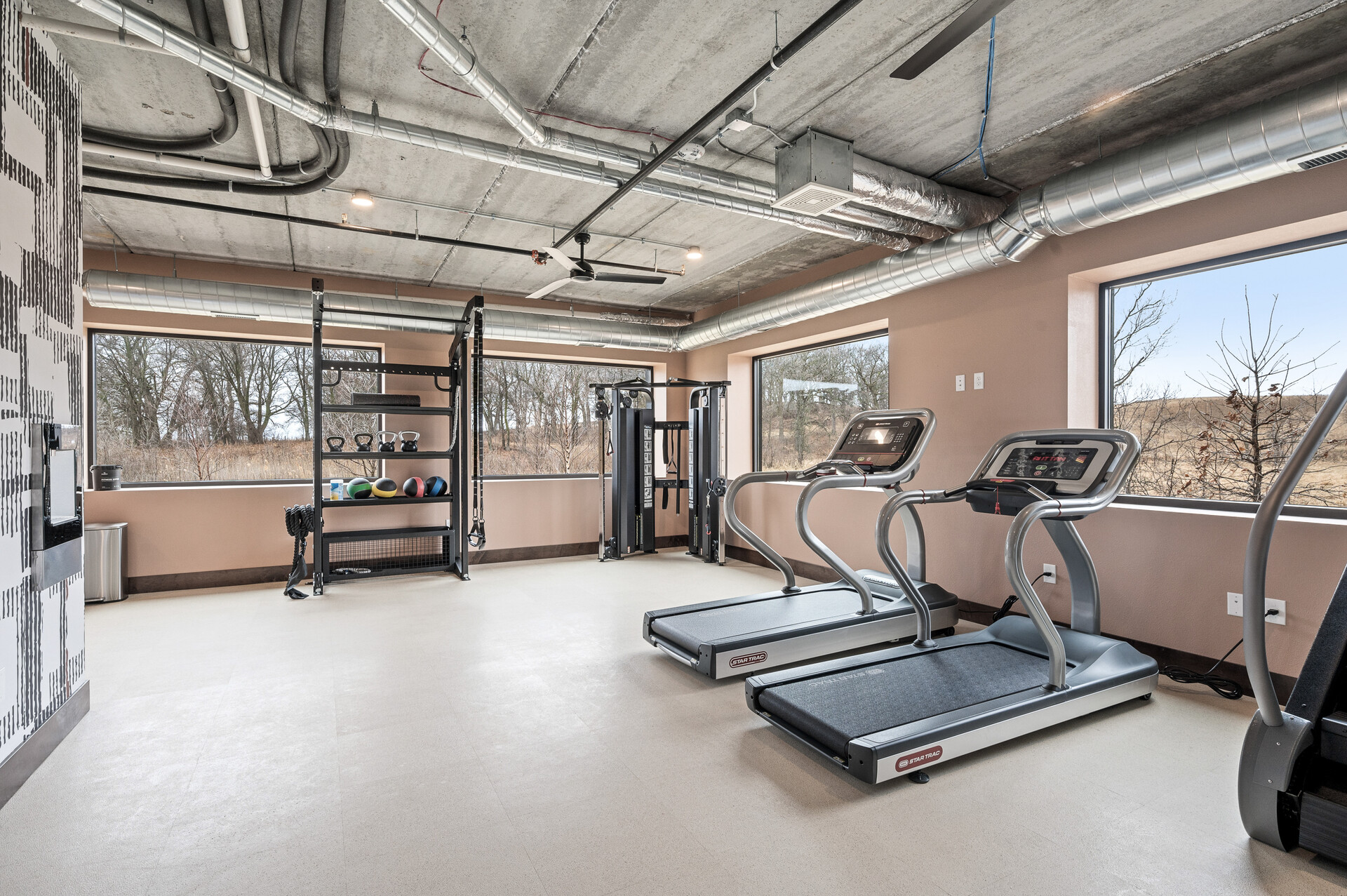 treadmills and other gym equipment in gym space